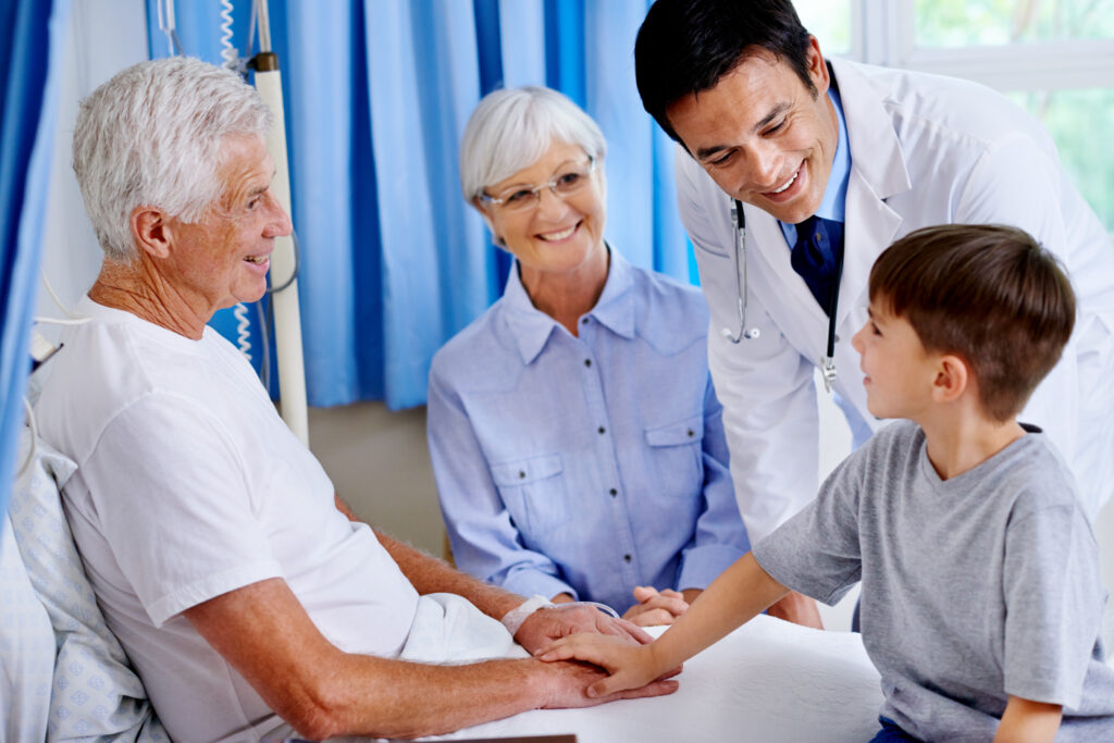 Family consulting with a doctor at a modern family medical clinic in Doha.