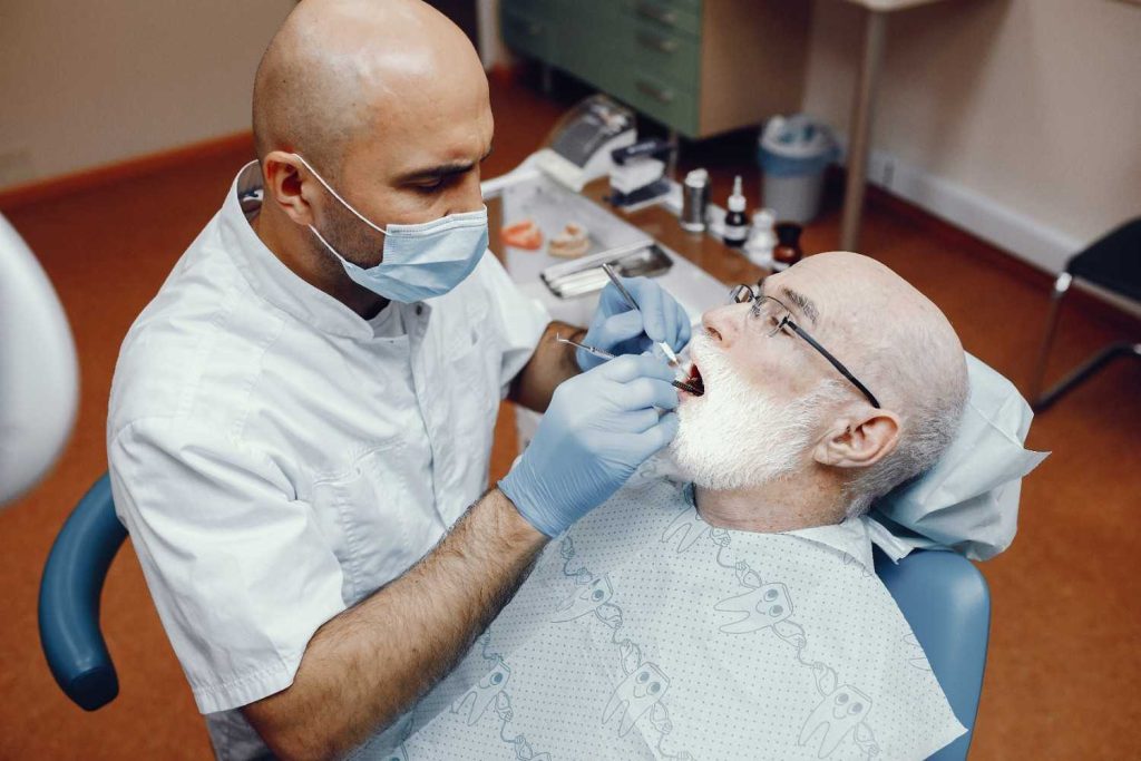 Dental implant procedure performed by a dentist in Doha